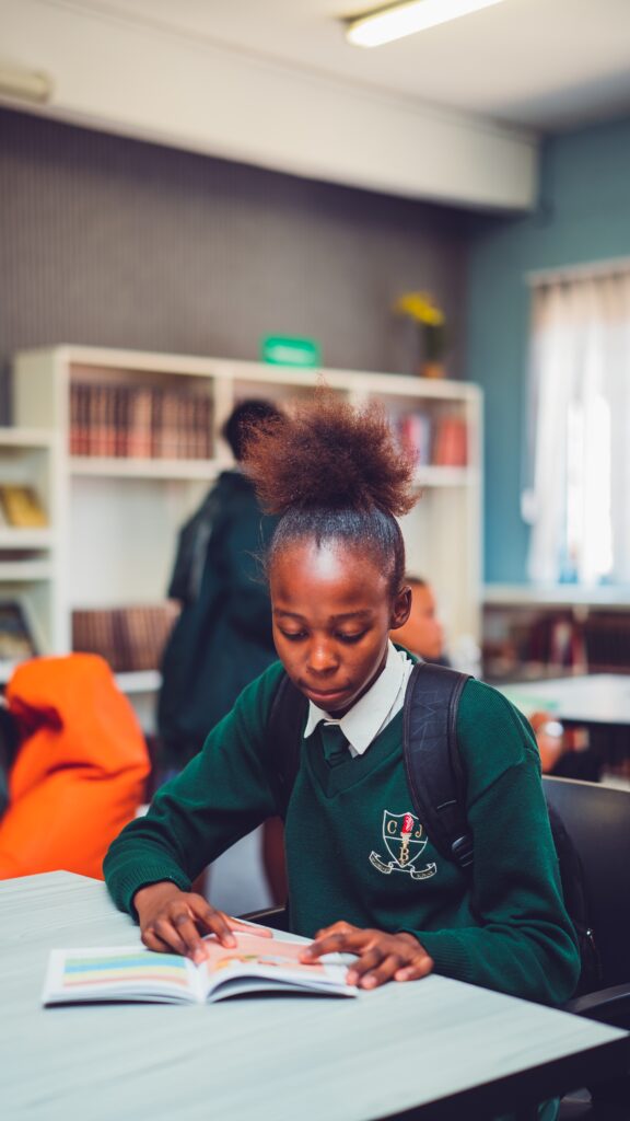Learner at CJ Botha Secondary School enjoying the spruced up library 2 (1)